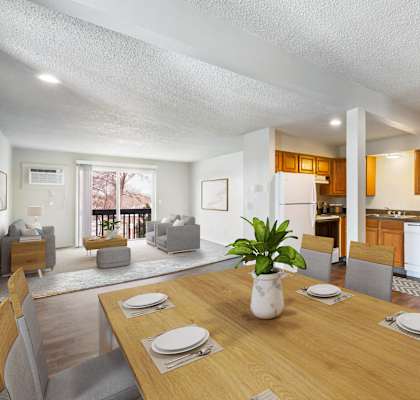 a living room and dining room with a table and chairs