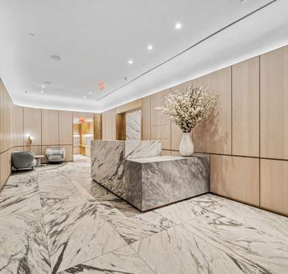 A marble floor in a hallway at ARIA 90-100 John Apartments, New York