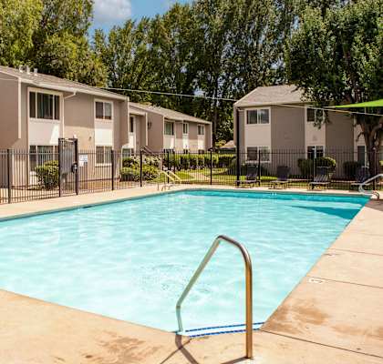 our apartments have a swimming pool with a fence around it