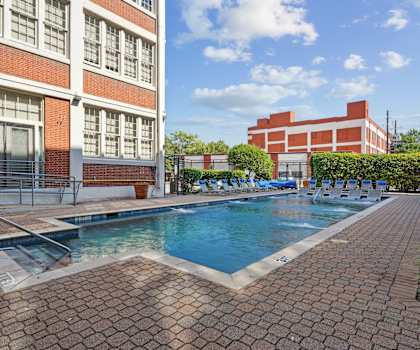 Sparkling swimming pool at Futura Lofts in Deep Ellum, Dallas Loft Apartments