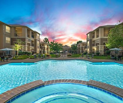 A large swimming pool in front of apartment buildings. at Stonepost Lakeside Apartment Homes, Olathe, KS