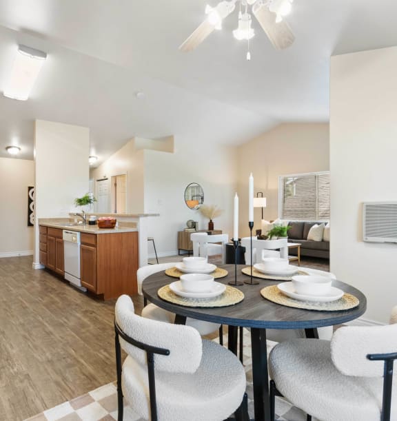 a dining room with a table and chairs