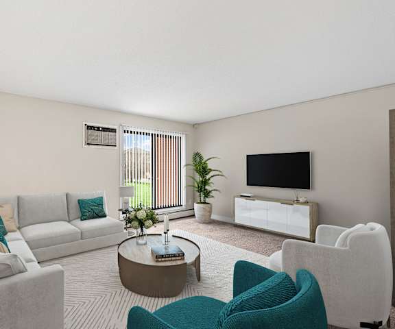 A living room with a grey sofa, a white armchair, and a coffee table.