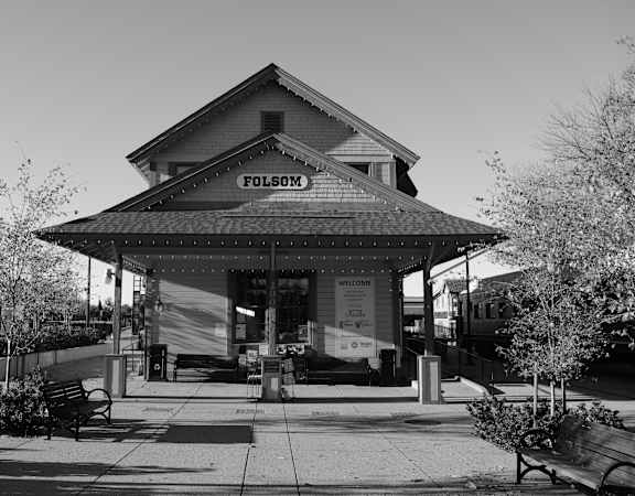A black and white image of a building with the word "Forson" on it.