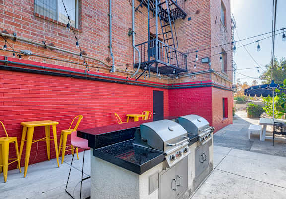 view of bbq's at rear of property