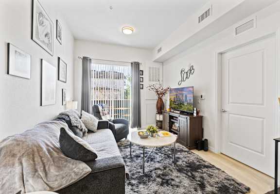 a living room with a couch and a coffee table