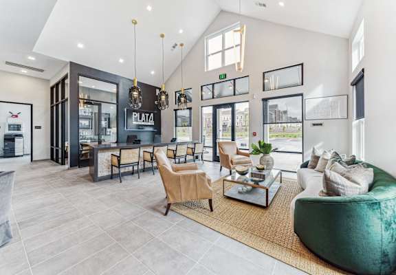 a living room with a couch and chairs and a table  at Plat 4 at Research Triangle, Durham