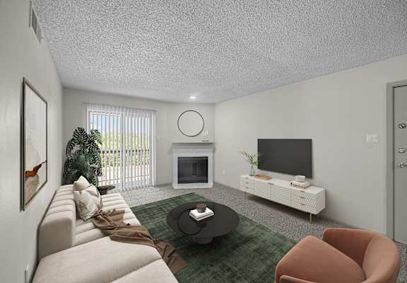 A living room with a couch, a coffee table, a television, and a plant.