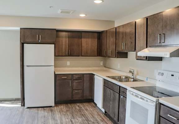 a kitchen at the cornhill landing apartments in rochester, ny