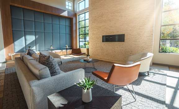 a living room with a couch chairs and a coffee table at Monterey Ranch, Austin, TX