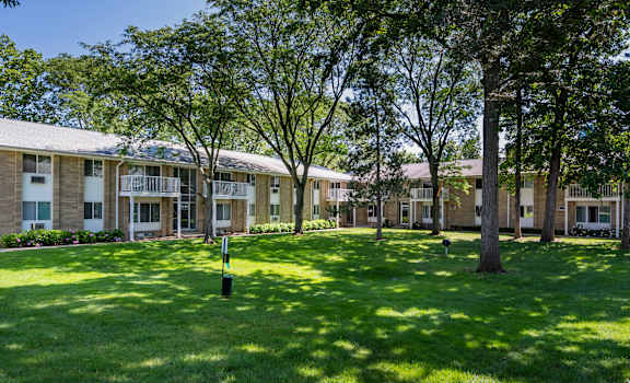 our apartments are located in a quiet area with grass and trees