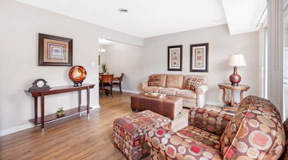 a living room with a couch and a chair