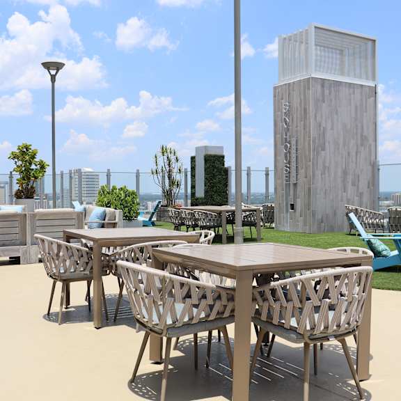 a rendering of a patio with tables and chairs on a rooftop
