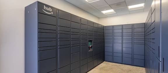 A row of black server racks in a data center.