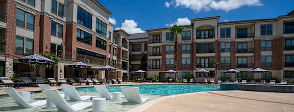 Lounge chairs around the pool at Imperial Lofts, Texas