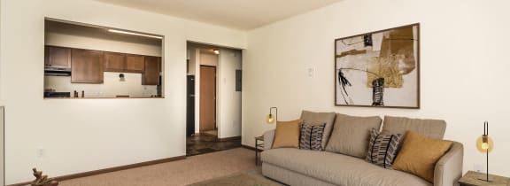 Grand Forks, ND Chandler 1866 | a living room with a couch and a coffee table