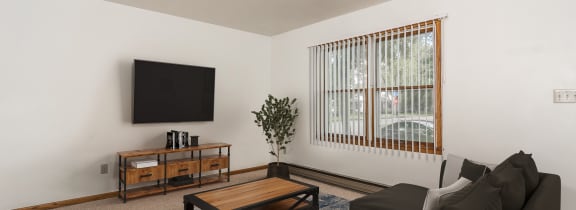 Grand Forks, ND Valley Home Duplexes | a living room with a couch and a coffee table