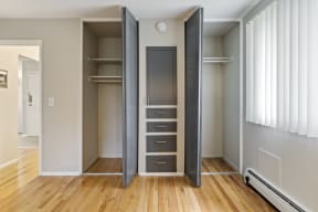 a bedroom with a wardrobe and a window