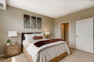 Large bedroom with attached bathroom and walk in closet in 2 bedroom apartment for rent at Ascend at Woodbury best apartments Woodbury MN 55129