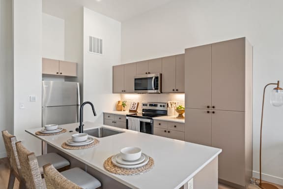 White Appliances In Kitchen at Solhavn Apartments, Utah, 84003