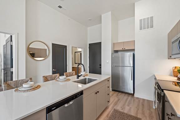 Updated Kitchen With Black Appliances at Solhavn Apartments, American Fork, Utah