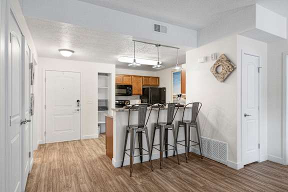 Kitchen with counter and pendant lights at The View on 20th, Ogden, Utah
