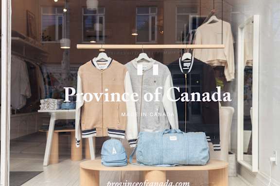 the province logo on a window of a clothing store