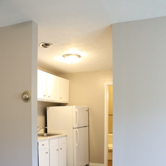 an overhead view of a room with a desk and a mirror