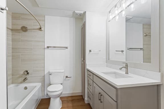 a bathroom with a sink toilet and a shower at The Legends at Eagle Mountain Lake, Texas