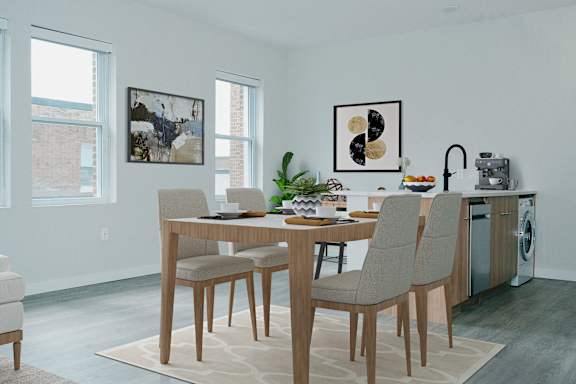 A dining room with a table and chairs.