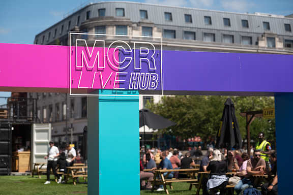 A busy outdoor area at Fairfax Apartments, Manchester