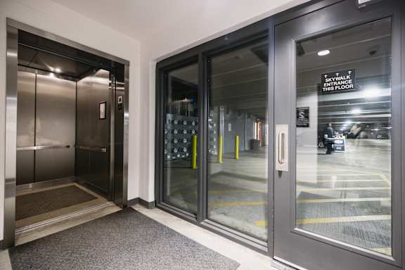 A glass door with a sign that says Skyvance on it.