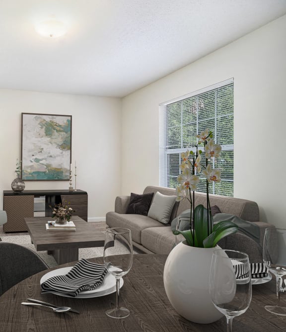 a living room with a couch and a table