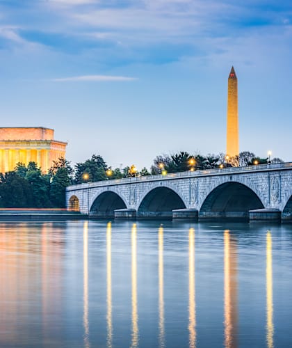 The Washington Monument and the Lincoln Memorial are reflected in the water.