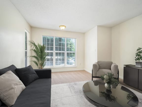 a living room with a couch and a coffee table