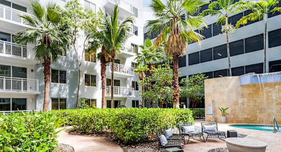 Lush Courtyard with Waterfall