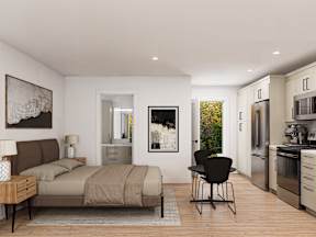 A modern bedroom with a bed, chair, and a painting on the wall.