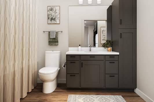 a black and white bathroom with a toilet and a sink