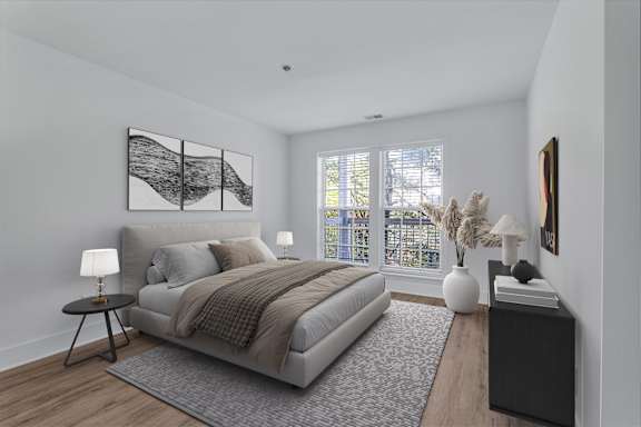 A bedroom with a large bed, a nightstand, and a window with blinds.