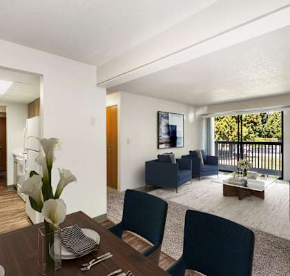 a living room and dining room with a table and chairs at Cedarwood, Wenatchee, WA