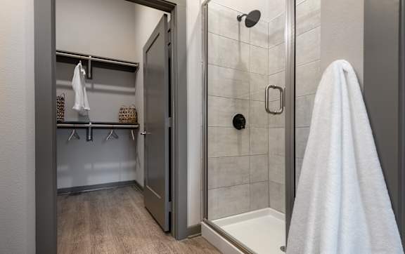 a bathroom with a toilet and a sink and a mirror