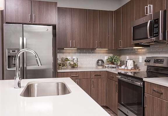 Kitchen with sink and faucet at The Kelley at Samuels Ave, Fort Worth, Texas