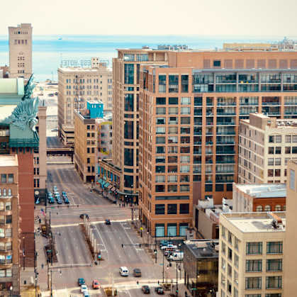 a view of the city from the top of a building