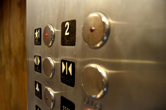 elevator buttons, Jazz District Apartments, Kansas City, MO