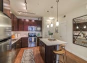 Thumbnail 14 of 22 - Burnet Flats Model Kitchen w/ Island