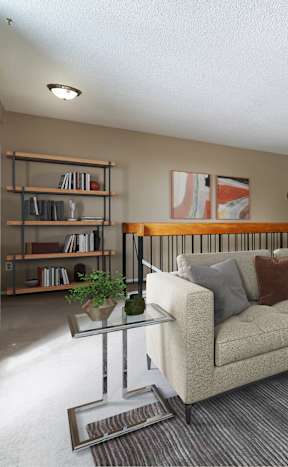A living room with a couch, chairs, and a coffee table.