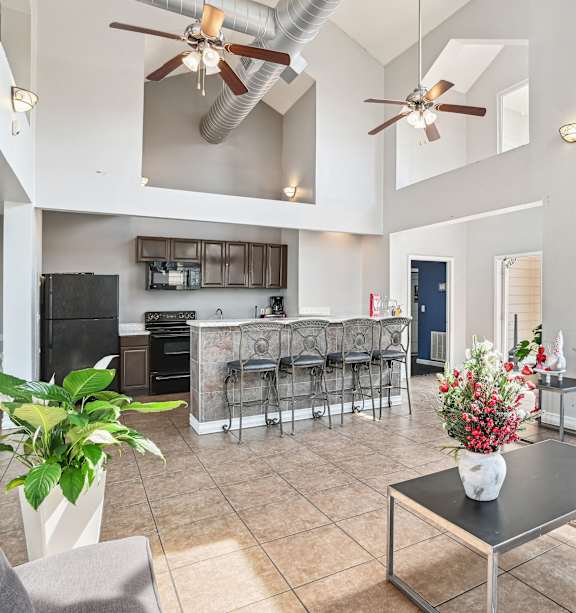 a living room with a couch and a table  at Wellington Farms, Charlotte