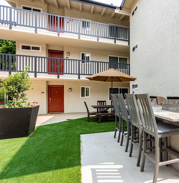 a bar with chairs and a grill on a patio at Parkway Terrace Apartments, Culver City, 90230