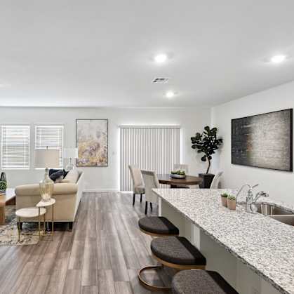 living room and dining room with contemporary furnitures and white walls