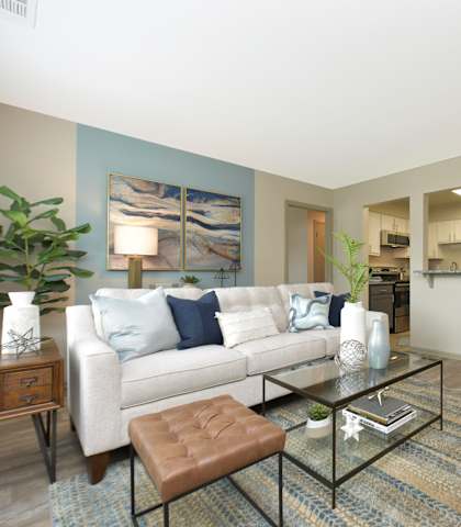 a living room with a couch and a coffee table